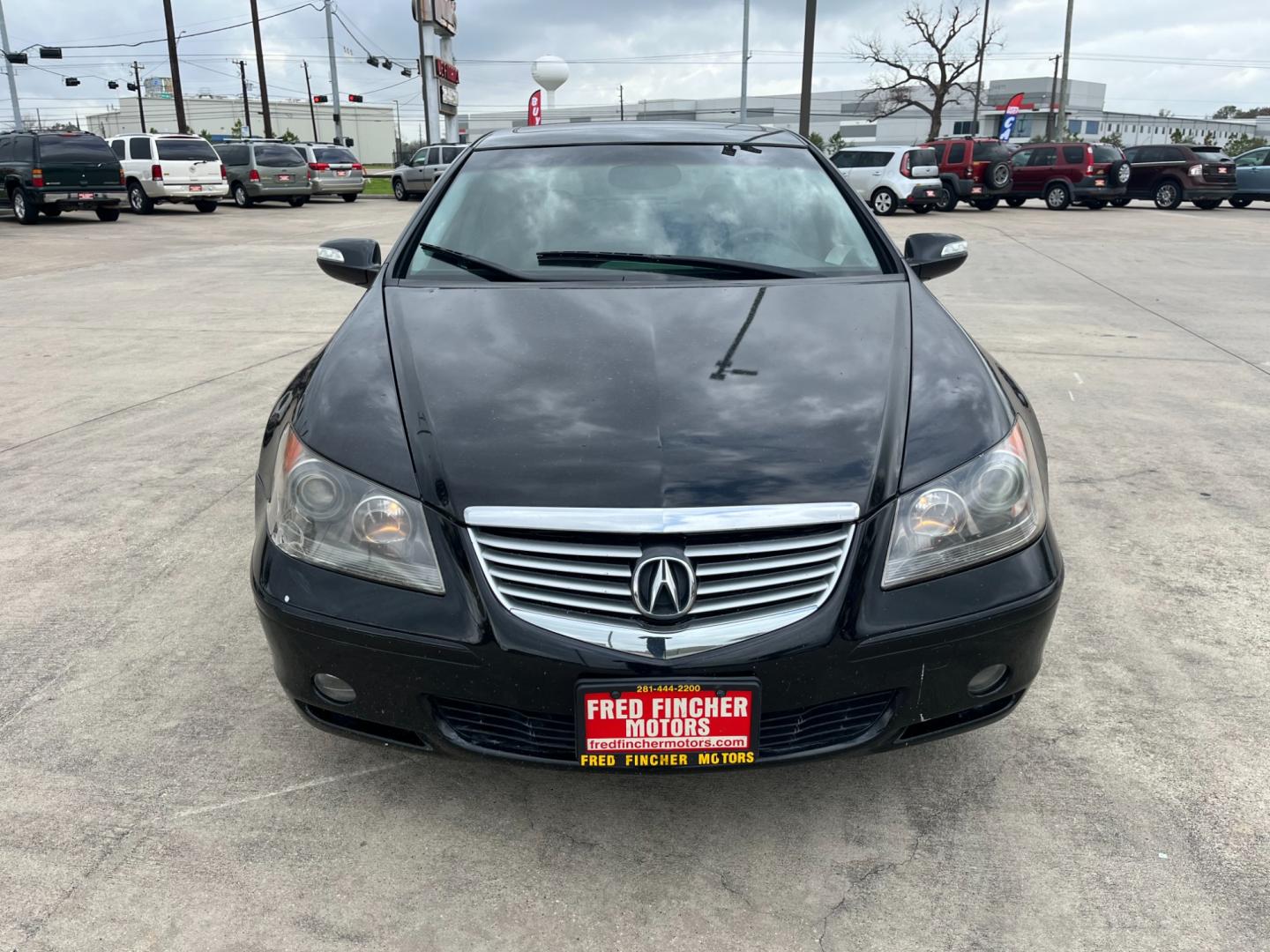 2005 Black /black Acura RL 3.5RL with Navigation System (JH4KB165X5C) with an 3.5L V6 SOHC 24V engine, 5-Speed Automatic Overdrive transmission, located at 14700 Tomball Parkway 249, Houston, TX, 77086, (281) 444-2200, 29.928619, -95.504074 - Photo#1